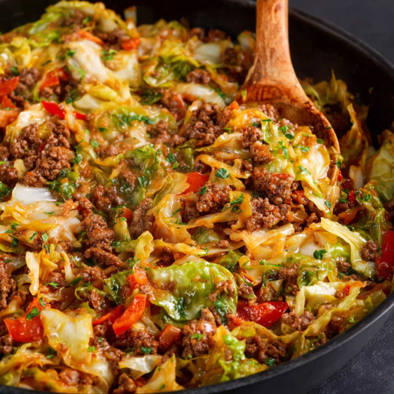 A delicious cheesy ground beef and cabbage skillet.