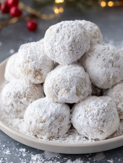A plate of snowball cookies.