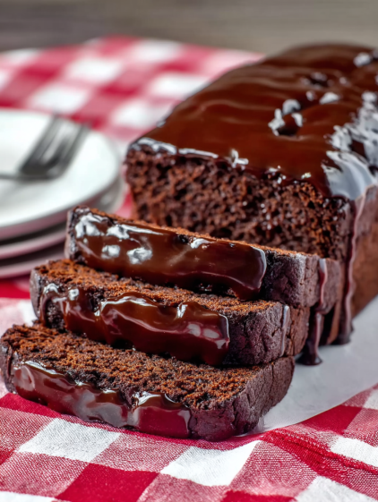 A slice of chocolate cake on a plate.