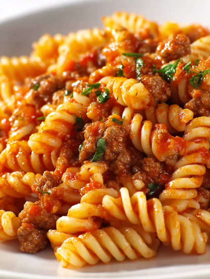 A plate of spaghetti with meat sauce.