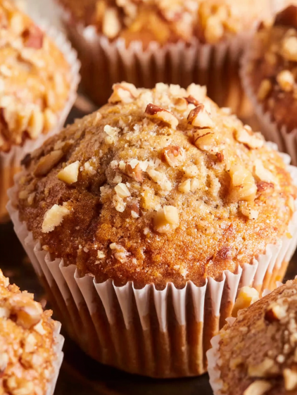 A close up of a banana nut muffin.