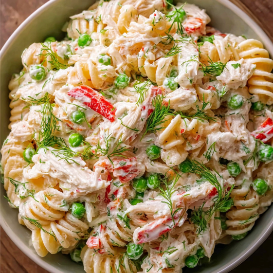 A bowl of crab pasta salad.