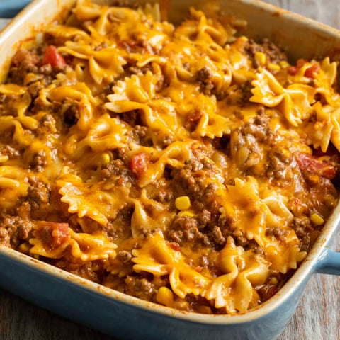 A casserole dish filled with pasta and meat.